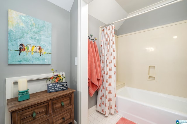 2300 Ridge Trl, Birmingham, AL 35242 - full bath featuring tile patterned floors, shower / bath combo with shower curtain, baseboards, and vaulted ceiling