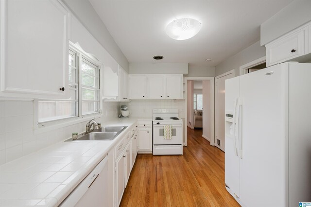 1718 Windsor Blvd, Homewood, AL 35209 - kitchen featuring white appliances, tile countertops, plenty of natural light, and a sink