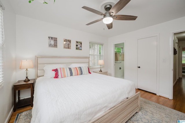 1718 Windsor Blvd, Homewood, AL 35209 - bedroom featuring wood finished floors, ensuite bath, baseboards, and a ceiling fan