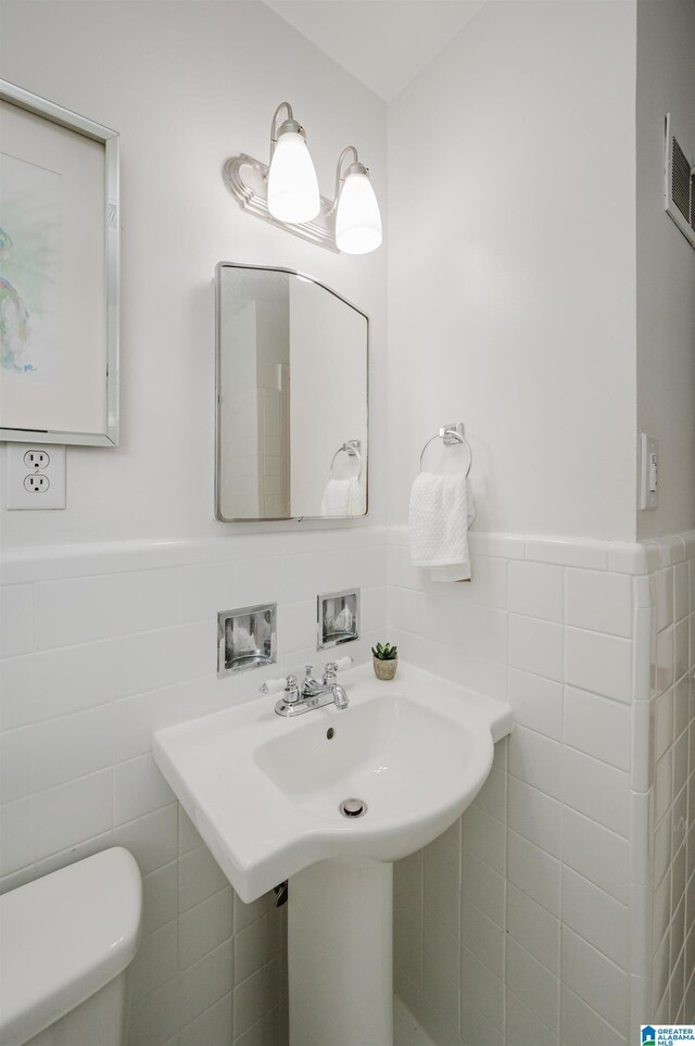 1718 Windsor Blvd, Homewood, AL 35209 - half bath with tile walls, toilet, and wainscoting