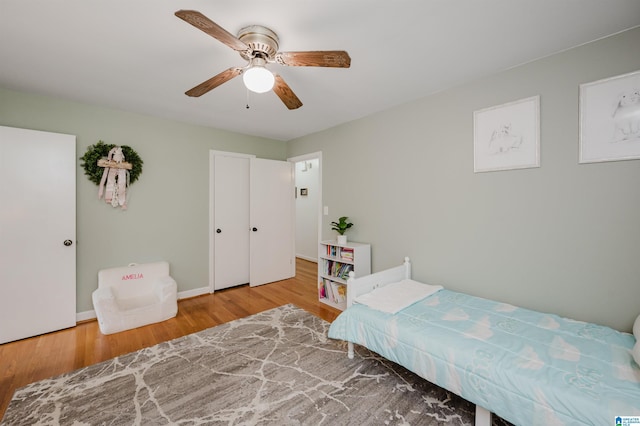 1718 Windsor Blvd, Homewood, AL 35209 - bedroom featuring wood finished floors, ceiling fan, and baseboards