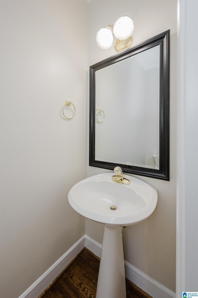 822 Boulder Ridge Cir, Hoover, AL 35244 - bathroom with baseboards, wood finished floors, and a sink