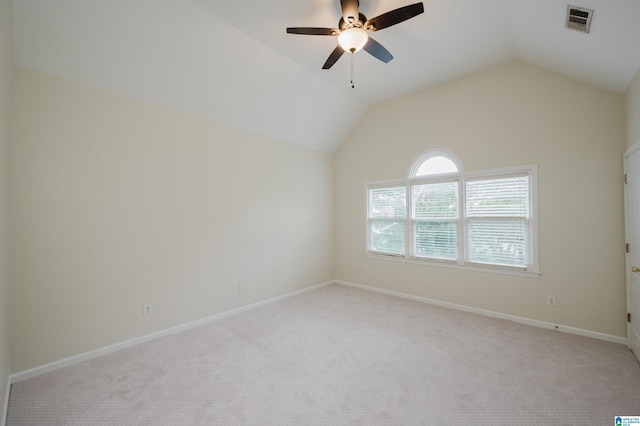 822 Boulder Ridge Cir, Hoover, AL 35244 - spare room with vaulted ceiling, light carpet, ceiling fan, and baseboards