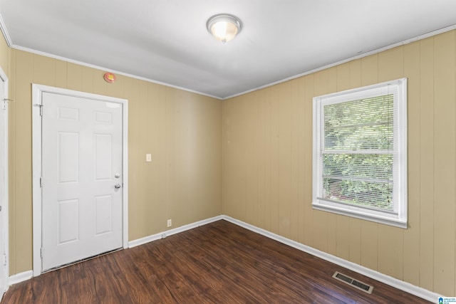 315 3rd Ave, Odenville, AL 35120 - spare room featuring dark wood-style flooring, crown molding, and baseboards