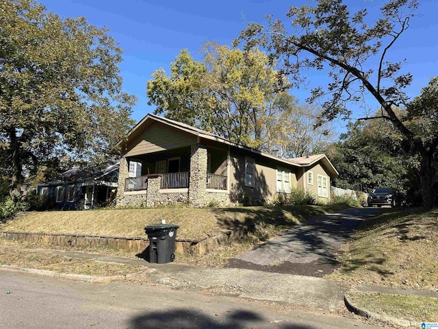 805 78th St S, Birmingham, AL 35206 - view of front of house with stone siding and driveway