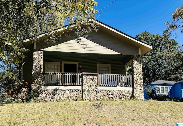 805 78th St S, Birmingham, AL 35206 - view of front of house with covered porch and a front yard