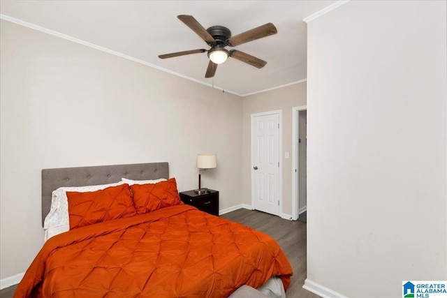 4808 S 3rd Ave, Birmingham, AL 35222 - bedroom featuring baseboards, wood finished floors, ornamental molding, and a ceiling fan