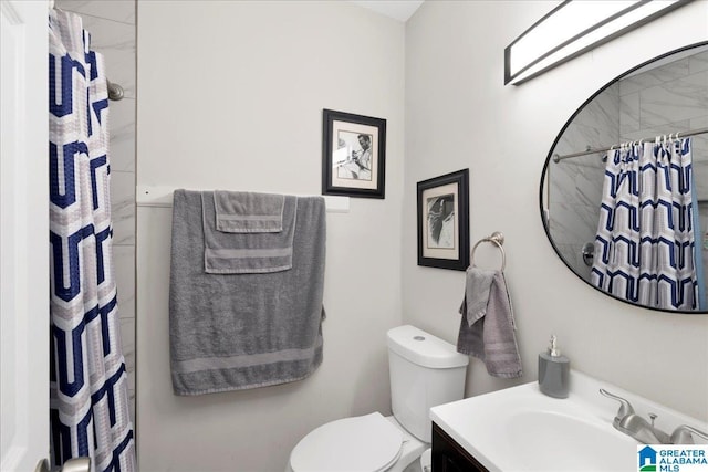 4808 S 3rd Ave, Birmingham, AL 35222 - bathroom with toilet, vanity, and a shower with curtain