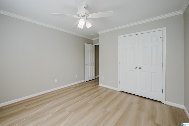 2019 Russet Meadows Ct, Helena, AL 35244 - unfurnished bedroom with light wood-style floors, crown molding, baseboards, a closet, and a ceiling fan