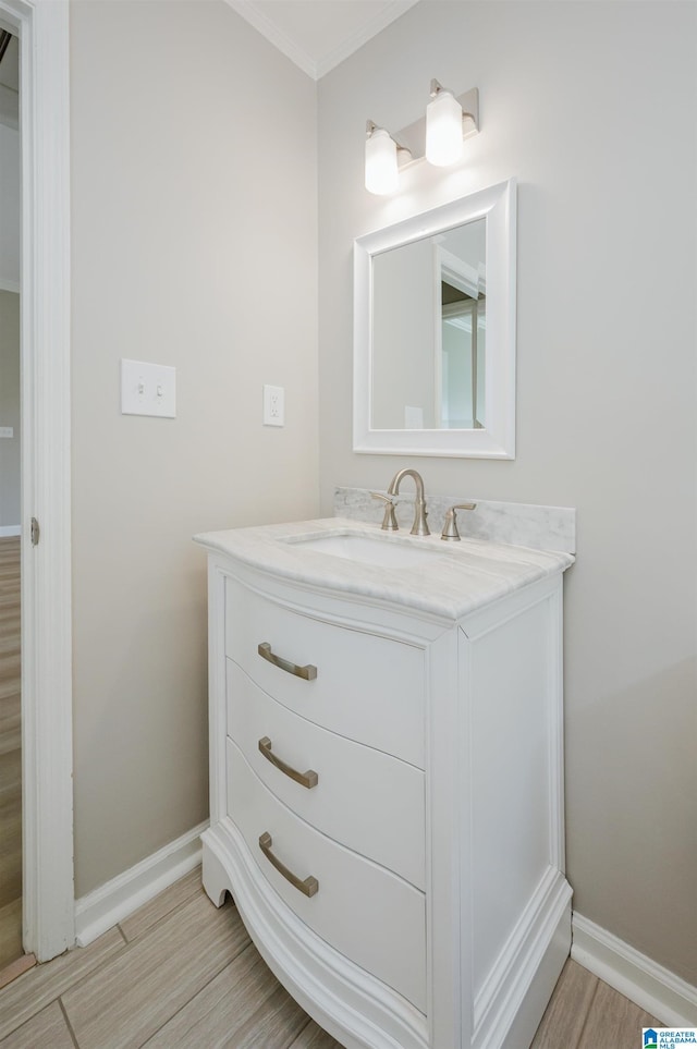 2019 Russet Meadows Ct, Helena, AL 35244 - bathroom featuring baseboards, vanity, crown molding, and wood finished floors