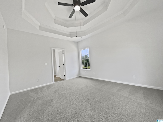 450 Bentmoor Way, Helena, AL 35080 - empty room featuring a tray ceiling, carpet, crown molding, ceiling fan, and baseboards
