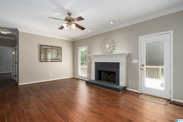 100 Redwood Dr, Trussville, AL 35173 - unfurnished living room with ceiling fan, dark wood-style floors, a fireplace, and ornamental molding