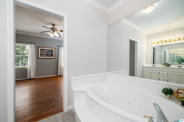 100 Redwood Dr, Trussville, AL 35173 - full bathroom featuring ornamental molding, a jetted tub, wallpapered walls, a ceiling fan, and double vanity