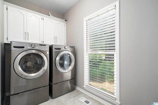100 Redwood Dr, Trussville, AL 35173 - laundry area featuring washing machine and clothes dryer and cabinet space