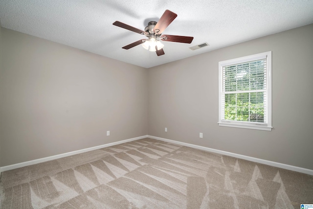 100 Redwood Dr, Trussville, AL 35173 - empty room with light colored carpet, a ceiling fan, and a textured ceiling