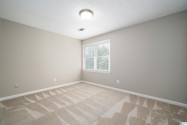100 Redwood Dr, Trussville, AL 35173 - spare room with light colored carpet and a textured ceiling
