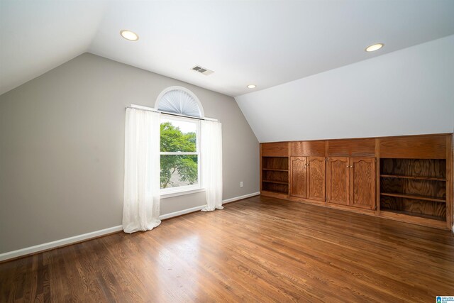 100 Redwood Dr, Trussville, AL 35173 - additional living space featuring vaulted ceiling, wood finished floors, and recessed lighting