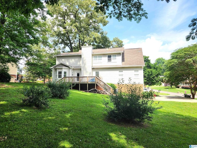 100 Redwood Dr, Trussville, AL 35173 - back of property with stairs, a chimney, a lawn, and a wooden deck