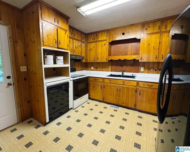 1315 Gloria Ln, Weaver, AL 36277 - kitchen with open shelves, electric range, a sink, brown cabinetry, and a textured ceiling