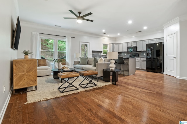 1033 Inverness Cove Way, Hoover, AL 35242 - living room featuring ornamental molding, a ceiling fan, wood finished floors, baseboards, and recessed lighting