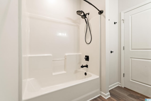 1033 Inverness Cove Way, Hoover, AL 35242 - full bath featuring wood finished floors, shower / tub combination, and baseboards