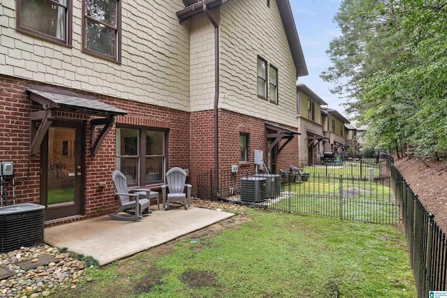 1033 Inverness Cove Way, Hoover, AL 35242 - view of yard with central air condition unit and a patio area