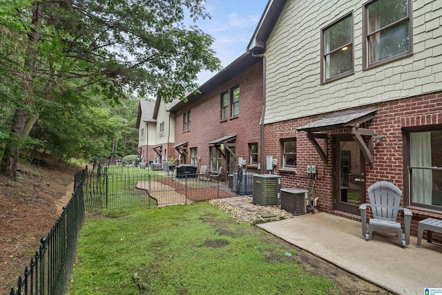1033 Inverness Cove Way, Hoover, AL 35242 - view of yard featuring central air condition unit and a patio