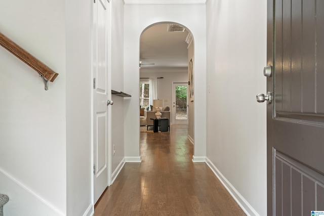 1033 Inverness Cove Way, Hoover, AL 35242 - entryway featuring arched walkways, dark wood-type flooring, crown molding, and baseboards