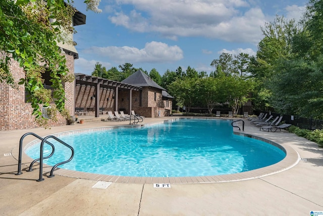 1033 Inverness Cove Way, Hoover, AL 35242 - community pool featuring a pergola and a patio