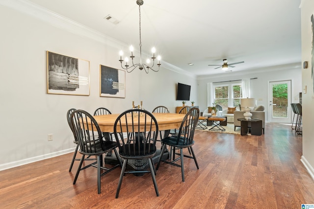 1033 Inverness Cove Way, Hoover, AL 35242 - dining space featuring ceiling fan, wood finished floors, crown molding, baseboards, and a chandelier