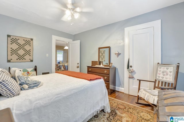 102 E Crest Rd, Hueytown, AL 35023 - bedroom featuring wood finished floors and a ceiling fan