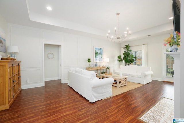 2014 Madison Cir, Chelsea, AL 35043 - living room with a raised ceiling, a chandelier, wood finished floors, a decorative wall, and recessed lighting