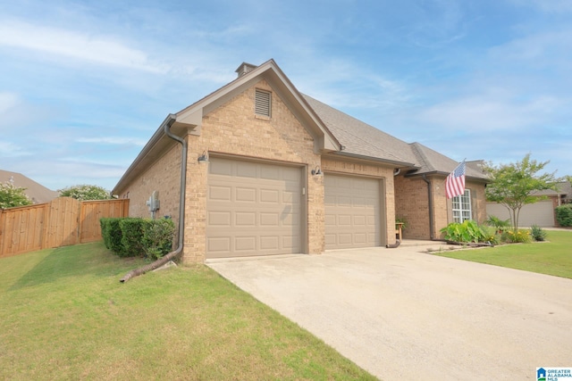 2014 Madison Cir, Chelsea, AL 35043 - view of front of home featuring an attached garage, driveway, brick siding, and a shingled roof