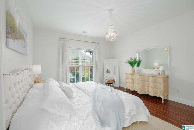 2014 Madison Cir, Chelsea, AL 35043 - bedroom featuring a chandelier, wood finished floors, and baseboards