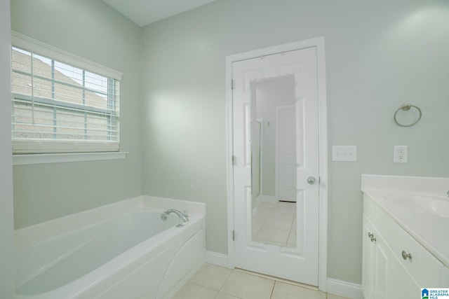 2014 Madison Cir, Chelsea, AL 35043 - bathroom featuring a garden tub, tile patterned flooring, vanity, and baseboards