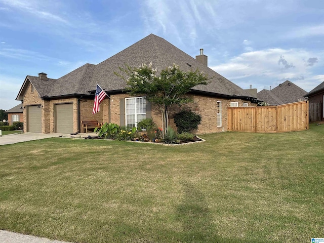 2014 Madison Cir, Chelsea, AL 35043 - view of front of house with a chimney, brick siding, and a garage
