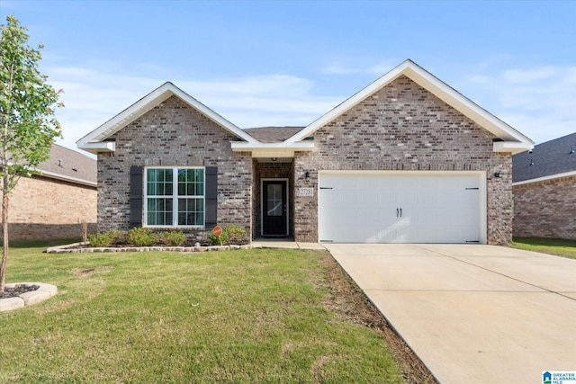 27281 Mckenna Dr, Athens, AL 35613 - ranch-style home featuring brick siding, a front lawn, driveway, and an attached garage