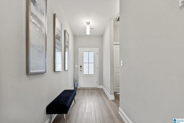27281 Mckenna Dr, Athens, AL 35613 - doorway with wood finished floors and baseboards