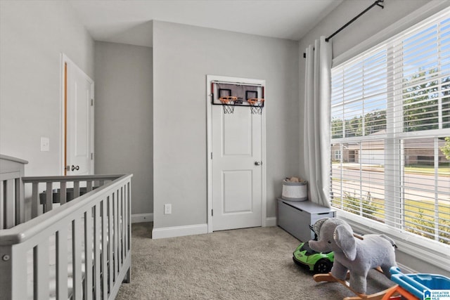 27281 Mckenna Dr, Athens, AL 35613 - bedroom with a nursery area, carpet flooring, and baseboards
