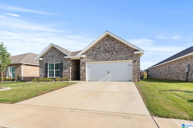 27281 Mckenna Dr, Athens, AL 35613 - view of front of house with brick siding and a front lawn