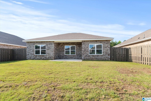 27281 Mckenna Dr, Athens, AL 35613 - rear view of property featuring brick siding and a patio area