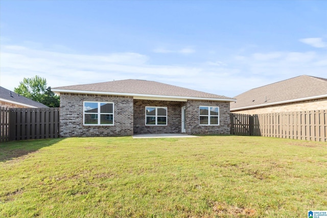27281 Mckenna Dr, Athens, AL 35613 - rear view of house featuring brick siding and a patio area