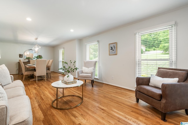 1355 Starcross Dr, Vestavia Hills, AL 35216 - living room featuring crown molding, light wood-type flooring, baseboards, and recessed lighting