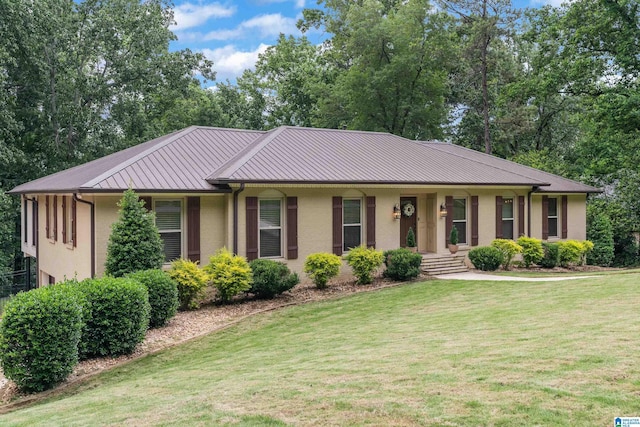 1355 Starcross Dr, Vestavia Hills, AL 35216 - ranch-style home featuring a front yard, metal roof, a standing seam roof, and a porch