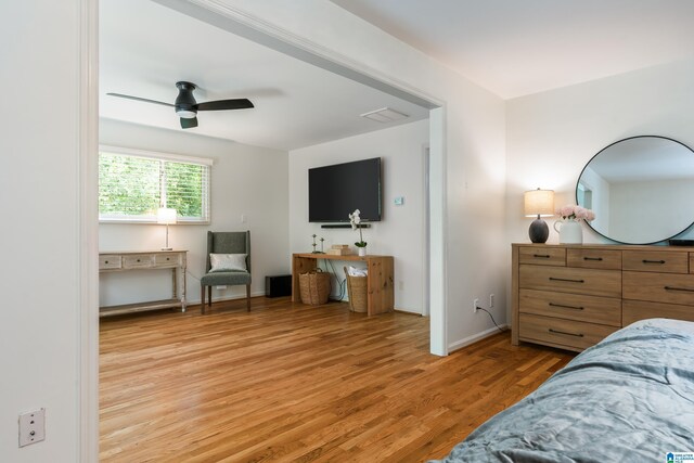 1355 Starcross Dr, Vestavia Hills, AL 35216 - bedroom with light wood finished floors, baseboards, and ceiling fan