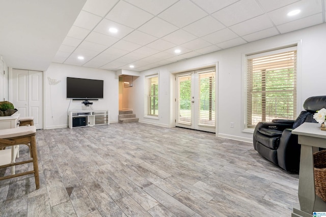 1355 Starcross Dr, Vestavia Hills, AL 35216 - living room with wood finished floors, baseboards, french doors, and a drop ceiling