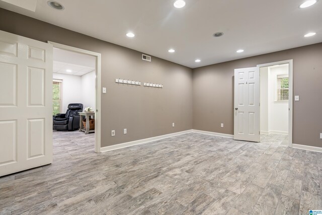 1355 Starcross Dr, Vestavia Hills, AL 35216 - empty room featuring plenty of natural light, recessed lighting, baseboards, and wood finished floors