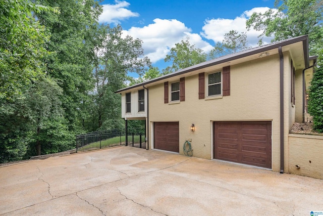 1355 Starcross Dr, Vestavia Hills, AL 35216 - view of front of home with a garage and driveway