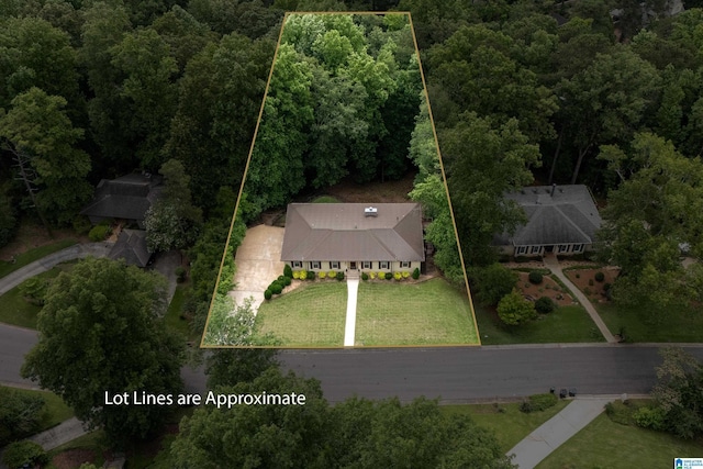 1355 Starcross Dr, Vestavia Hills, AL 35216 - aerial view of property and surrounding area featuring a forest and property boundaries highlighted