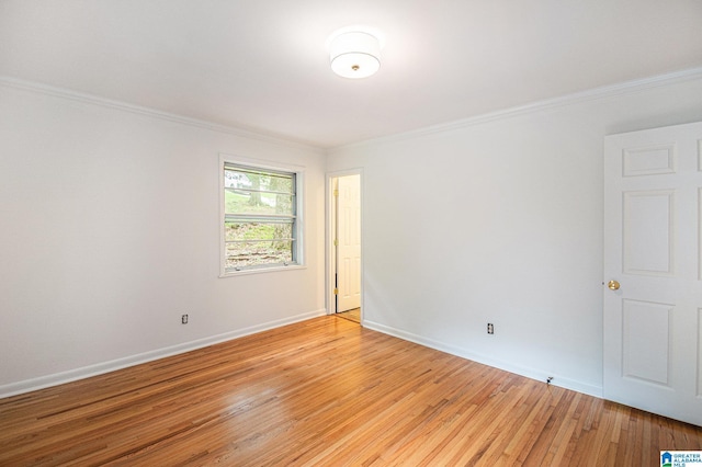 2970 Lake Park Cir, Birmingham, AL 35242 - empty room with crown molding, light wood-style floors, and baseboards